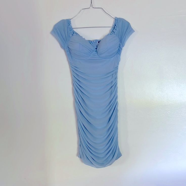 Size Small Light Blue Mini Dress Materials Are Nylon, Spandex And The Lining Is Polyester Brand Is Windsor Brand New With Tag Originally $42.90 Off The Shoulder Dress Built In Bra Padding Ruched Bodycon Dress Great For Homecoming Or For Any Party Light Blue Ruched Knee-length Mini Dress, Fitted Light Blue Bodycon Mini Dress, Blue Stretch Dresses With Ruched Bodice, Light Blue Ruched Midi Dress, Blue Stretch Dress With Ruched Bodice, Blue Ruched Fitted Dress, Light Blue Fitted Dress With Ruched Bodice, Fitted Light Blue Dress With Ruched Bodice, Blue Stretch Ruched Dresses