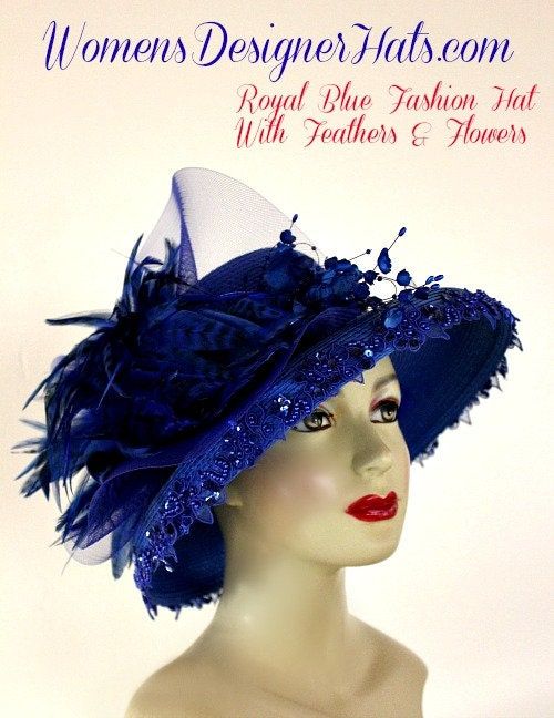 Ladies Royal Blue Designer Kentucky Derby Hat With Striped Royal Blue Exotic Feathers, Accented With Delicate Hand Dyed Royal Blue Flowers With Royal Blue Pearls. A Beautiful Royal Blue Sequin Pearl Trim Wraps Around The Crown Of This Occasion Hat. This Designer Custom Made Hat Is A Show Stopper. This Fashion Hat Is Suited For The Holidays, Church, Synagogue, Cocktail Black Tie Parties, Weddings And Formals. Women's Designer Hats Specializes In Custom Made Designer Hats For Women, Cocktail Hats, Hat Wedding Guest, Wedding Guest Hat, Royal Blue Fashion, Wedding Hats For Guests, Special Occasion Hats, Mother Of The Bride Hats, Ladies Dress Hats, Royal Blue Flowers, Custom Made Hats