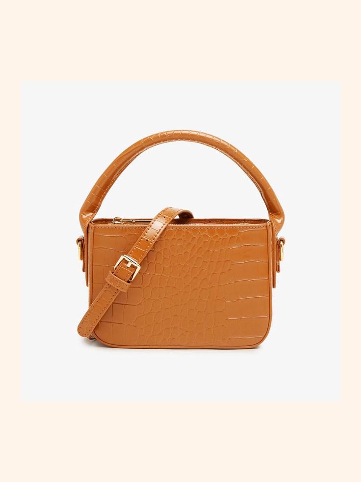 Women's Croc Print Mini Handbags in Vegan Leather Product Description This mini handbag is smart but in great fashion. Featured vegan PU leather Croc print design Four colors available Adjustable shoulder strap Solid top handle High-quality Metals Solid & smooth zipper closure Careful lining Bag measures: L18 * W6 * H12 cm Similar Products h2 { text-align: center; } .red-box { width: 100%; display: flex; flex-direction: row; flex-wrap: wrap; justify-content: center; } .red-box > div { width: 240 Rectangular Faux Leather Shoulder Bag For On-the-go, Trendy Leather Box Bag With Adjustable Handle, Trendy Leather Box Bag With Handles, Trendy Leather Baguette Bag With Adjustable Handle, Trendy Brown Baguette Bag For On-the-go, Square Leather Baguette Bag With Handles, Trendy Brown Handheld Box Bag, Trendy Handheld Brown Box Bag, Trendy Faux Leather Shoulder Bag With Top Carry Handle