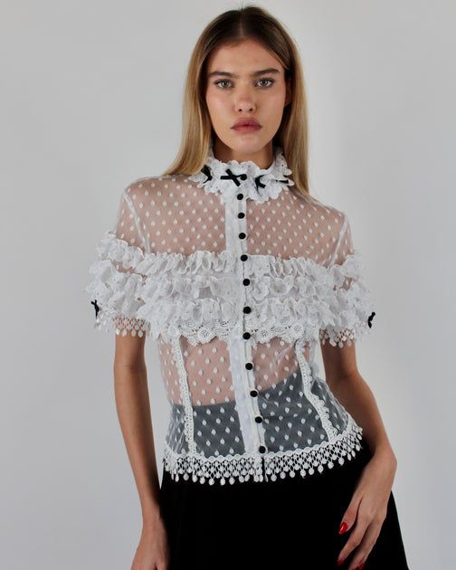 Luxury Blouse With Lace Trim, Elegant Puff Sleeve Lace Top, Elegant Lace Top With Puff Sleeves, Short Sleeve Lace Top With Ruffles, Elegant Tops With Ruffled Collar For Daywear, Elegant Ruffled Collar Tops For Daywear, Elegant Daywear Tops With Ruffled Collar, Fitted Lace Tops With Ruffles, Elegant Fitted Lace Top With Puff Sleeves