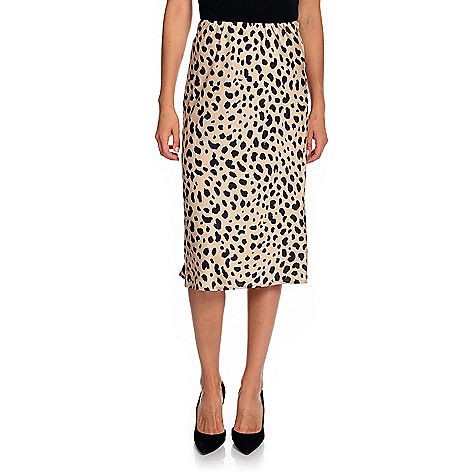 Skirt Color ChoicesLeopard - Shiny warm wheat brown undertone with true black spotsSkirt SizingFit: Form-fits through hipsHemline: Straight; lands near or below-the-kneeModel Notes: Model in Leopard is 5'7" with a 32" bust and 25" waist; wearing size XSSize Guide: View the Size Chart to determine your size and how to measureSkirt DetailsFabric Content: Made of 100% polyesterCare Instructions: Machine wash/Tumble dryCountry of Origin: ChinaPlease see the Garment Measurements tab for the actual me Relaxed Viscose Skirt For Day Out, Casual Viscose Skirt For Day Out, Viscose Skirt For Day Out, Trendy Midi-length Pencil Skirt For Spring, Chic Spring Pencil Skirt With Elastic Waistband, Trendy Midi Length Pencil Skirt For Spring, Chic Flowy Leopard Print Skirt, Viscose Midi-length Bottoms For Summer, Chic Lined Leopard Print Skirt