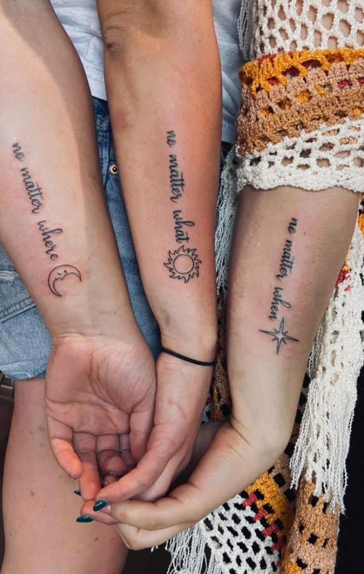 two people are holding hands with tattoos on their arms and the words, i love you to