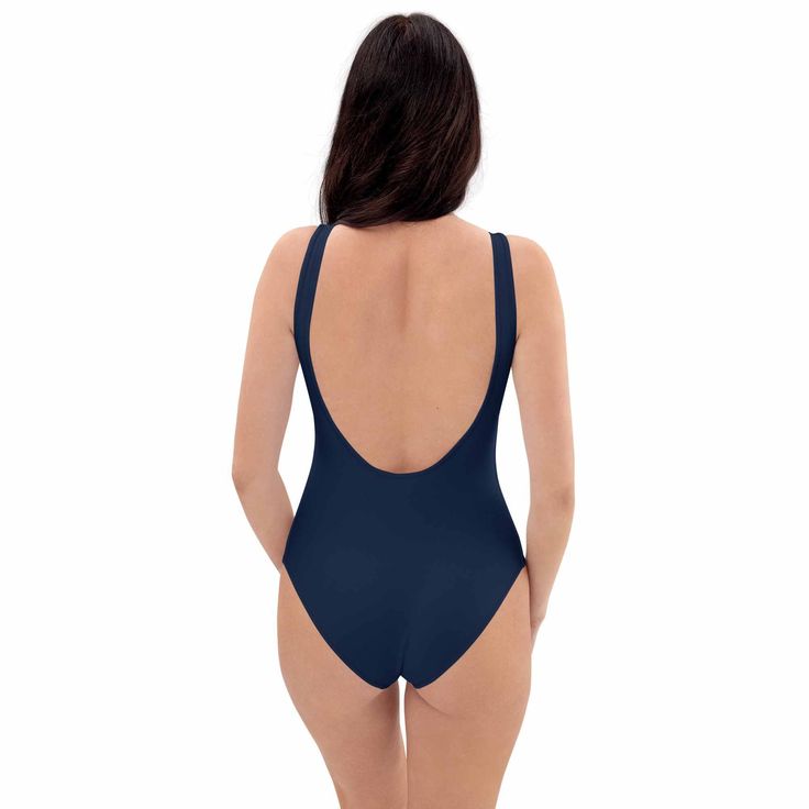 Elevate your beach style with this navy blue swimsuit. Comfortable double layer design, perfect for every trendy woman. Swim and shine all day in our chic one piece. Your must-have women's swimwear is here.- Stylish navy blue women's swimsuit- Comfortable double-layer design- Trendy one-piece swimsuit option- Versatile beachwear for women of all ages Navy Fitted Swimwear For Sunbathing, Fitted Navy Swimwear For Sunbathing, Navy Swimwear For Swimming, Navy Fitted Swimwear For Swimming, Fitted Navy Swimwear For Swimming, Navy Swimwear For Sunbathing Beach Season, Fitted Navy Swimwear For Beach Season, Navy Beachwear Swimwear For Poolside, Navy Lined Swimwear For Beach