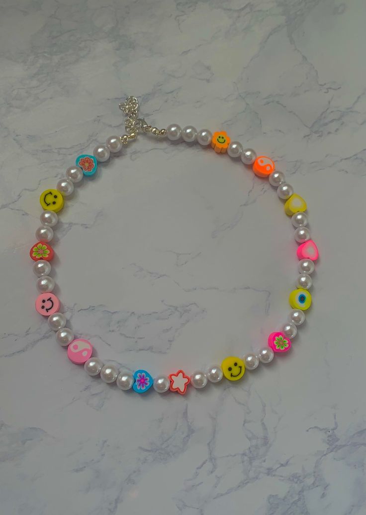 Cute very colorful bead necklace with random colorful beads. Perfect for any occasion or outfit! Perfect birthday gift or for yourself! Adjustable chain and custom sizing. Collares Aesthetic, Bead Business, Preppy Necklaces, Bracelet Inspo, Faux Pearl Bracelet, Bracelet Shop, Diy Bracelet Designs, Phone Charms, Pearl Choker Necklace