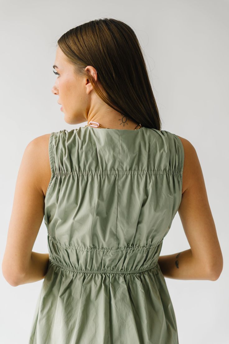 Get ready to turn heads in The Laserna Tie Detail Midi Dress in Sage! This stunning dress features a unique tie detail that adds a touch of elegance to the classic midi style. Perfect for any occasion, this dress will make you feel confident and stylish. Don't miss out on this must-have piece for your wardrobe! Details self/lining: 100% cotton Fabric Care Guide Here Sizing & Fit Measurements are approximate and taken while laying flat across the front. Not doubled. small: bust = 18"; waist = 14" Spring Midi Dress With Tie Fastening For Brunch, Spring Brunch Midi Dress With Tie Fastening, Spring Midi Dress With Smocked Back For Work, Spring Midi Dress With Tie Fastening For Daywear, Spring Midi Dress With Gathered Waist For Date Night, Chic Maxi Dress With Tie Fastening For Daywear, Chic Midi Dress With Tie Fastening For Day Out, Spring Workwear Midi Dress With Smocked Back, Chic Midi Dress With Gathered Waist