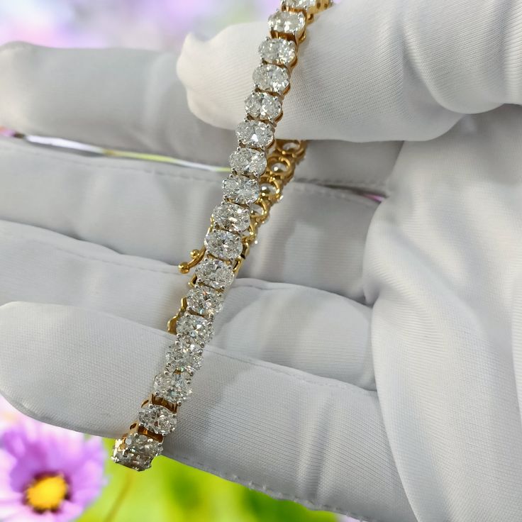 "Oval Diamond Tennis Bracelet | Lab Grown Diamond Bracelet | 14K Yellow Gold Oval Diamond Bracelet | Wedding Gift | Oval Lab Diamond Bracelet ◆𝐃𝐢𝐚𝐦𝐨𝐧𝐝 𝐃𝐞𝐬𝐜𝐫𝐢𝐩𝐭𝐢𝐨𝐧 ➺ Diamond: Lab Grown Diamonds ➺ Shape: Oval Brilliant Cut ➺ Diamond Color: E/F ➺ Diamond Clarity: VVS/VS ➺ Stone Size: 5.45 x 3.85 MM ➺ Each Diamond Weight: 0.32 Each ➺ Total Diamond Wt.: 13.00Ct. ➺ No. of Diamonds: 40 ◆𝐁𝐫𝐚𝐜𝐞𝐥𝐞𝐭 𝐃𝐞𝐭𝐚𝐢𝐥𝐬 ➺ Metal purity: 14k Yellow Gold (Also Available in 10,18 Kt.) ➺ Met Luxury Oval Diamond Bracelet With Prong Setting, Exquisite Oval Diamond Bracelet For Formal Occasions, Oval Tennis Bracelet For Anniversary, Fine Jewelry, Anniversary Oval Tennis Bracelet Fine Jewelry, Oval Tennis Bracelet For Anniversary, Luxury Oval Bracelets With Prong Setting, Luxury Oval Diamond Bracelet For Anniversary, Oval Diamond Bracelet For Anniversary, Fine Jewelry Style, Fine Jewelry Oval Diamond Bracelet For Anniversary