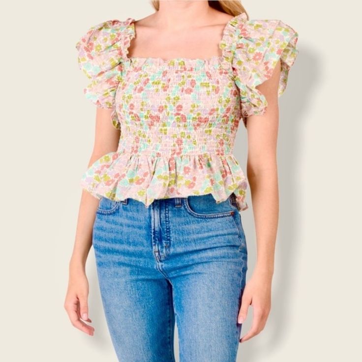 Last Pic For Fit, Not Color Or Pattern. A Beautiful Ruffled Bodice Top That Gives Off Soft Cottagecore In The Summer Vibes. I Am In Love With This Brand And Its Patterns And This Is A Quality Top That Does A Good Job Of Showing That Off! Versatile And Easy To Style. Wear Jeans, Overalls, A Skirt, Shorts, And Dress It Up With This Top. A Great Top For Warm Weather And A Layerable One For Transition Seasons! 100% Cotton Message Me For Additional Info Feminine Pink Blouse With Smocked Cuffs, Pink Puff Sleeve Blouse With Smocked Back, Multicolor Smocked Bodice Cotton Top, Multicolor Smocked Cotton Top, Spring Pink Blouse With Smocked Back, Pink Smocked Back Blouse For Spring, Pink Floral Smocked Top For Spring, Pink Blouse With Smocked Back For Spring, Multicolor Summer Top With Smocked Cuffs