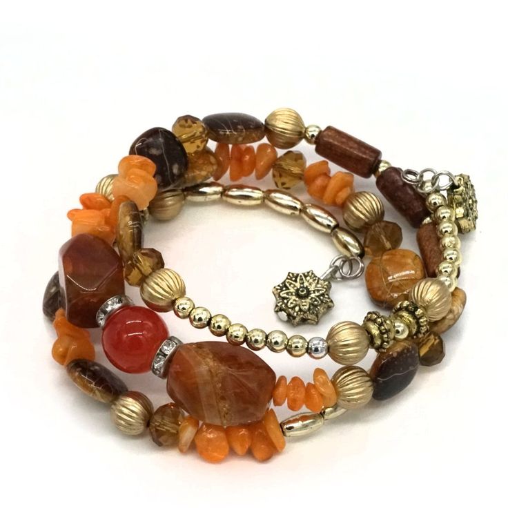 Memory Wire, Bangle Style. 3 Strands. 2 Charms. Amber Colored Beads. Fast Shipping. Free Gift With Purchase. Mybeademporium.Com B 544 Bohemian Amber Beaded Bracelets Hand-strung, Orange Bohemian Beaded Bracelets, Amber Bohemian Bracelets With Colorful Beads, Adjustable Orange Beaded Spiritual Bracelet, Orange Bohemian Bracelets With Spacer Beads, Amber Bohemian Bracelet With Colorful Beads, Bohemian Amber Bracelet With Colorful Beads, Adjustable Orange Spiritual Beaded Bracelet, Spiritual Orange Adjustable Beaded Bracelets