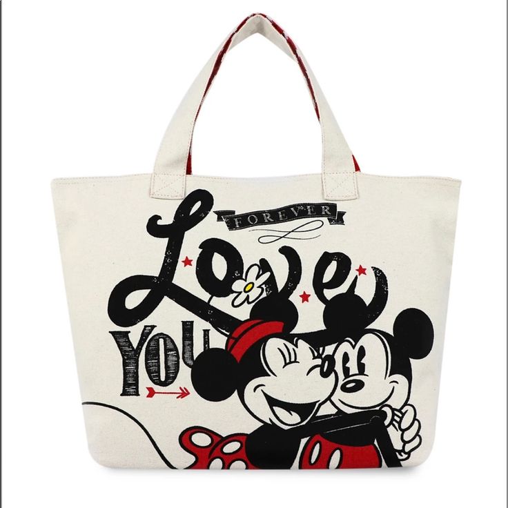 Carry Your Love For Disney's Original Sweethearts With You Everywhere You Go With This Romantic Tote Featuring Mickey And Minnie. The Pie-Eyed Couple Are Pictured In Different Images On Both Sides Of This Sturdy Canvas Bag That Is Fully Lined With A Polka Dot And Heart Print. Magic In The Details Mickey And Minnie Screen Art On Both Sides One Side Features ''Forever Love You'' One Side Features ''Love'' Interior Zip Pocket Fully Lined Lining Features Allover Polka Dots And Hearts Print Reinforce Cute Red Bags For Valentine's Day, Disney Mickey Mouse Bags For Gifts, Cute Mickey Mouse Bags For Gifts, Cute Mickey Mouse Bags As Gift, Cute Red Minnie Mouse Bag, Red Minnie Mouse Bag For Gift, Cute Red Bag For Disney Trips, Casual Red Bag For Disney Fan Events, Red Minnie Mouse Bag For Disney Fan Events