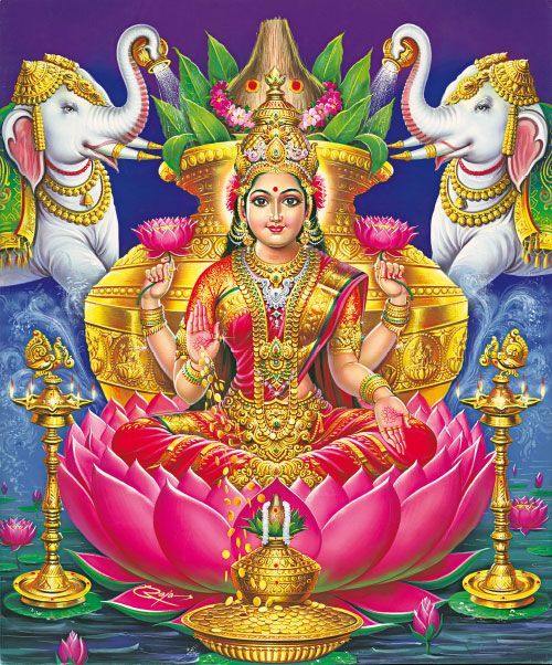 the hindu goddess sitting on top of a lotus flower with two elephants in the background