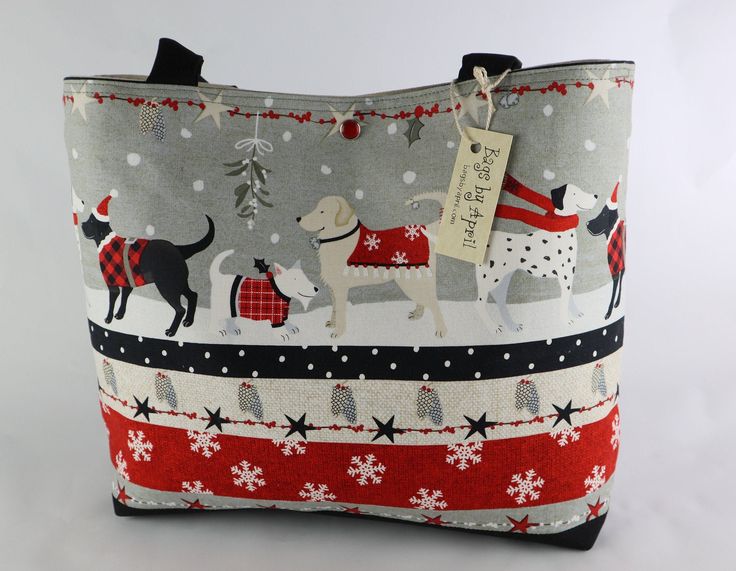 a bag with dogs and snowflakes on it