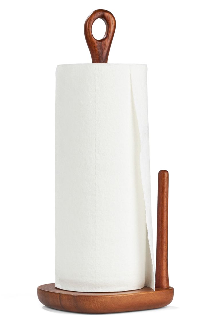 a roll of toilet paper sitting on top of a wooden holder