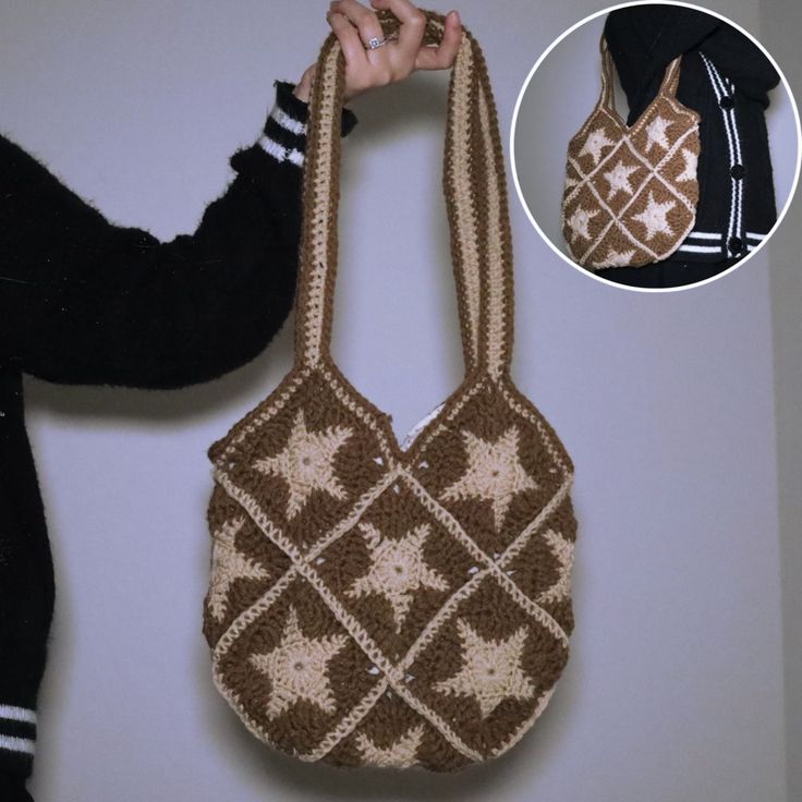 a crocheted purse is being held up by a woman's hand with the same pattern on it