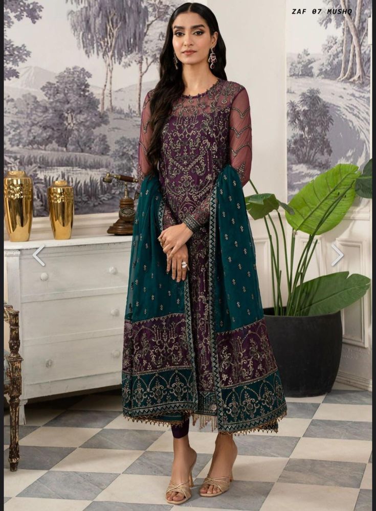 **Hello Beautiful Ladies** full sleeves lining attached  Embroidered 3 Piece Suit Shirt Front and Back Sequins Embroidered Net Sleeves Sequins Embroidered Net Dupatta Zinc Sequins Embroidered Net Dupatta Laces Purple Embroidered Pallu 2 Sides Zinc Embroidered Pallu 2 Sides Zinc Embroidered Lace 4 Sides Front and Back Lace Zinc Sequins Embroidered Lace Sleeves Lace Zinc Sequins Embroidered Lace Trouser Dyed Raw Silk 💕*One Level Up*💕 👌*A One Quality*👌 👌*Orignal Dresses*👌 👉* Suit Size *  : Only Large Size Available 👉* (Fully Stitched Just Like a Model Ready To Wear)* Presenting New Pakistani Designer Party Wear, Eid Wear, Occasion Wear Look Top-Trouser and Dupatta With Heavy Embroidery Work By Tawakkal Fabric           High Lights  *One Level Up*💕 *Pakistani Original Brand*👌 *Kameez Formal Purple Salwar Kameez With Dabka Work, Semi-stitched Long Sleeve Dress For Navratri, Unstitched Long Sleeve Dresses For Navratri, Long Sleeve Semi-stitched Dress For Navratri, Green Long Sleeve Churidar For Eid, Formal Green Anarkali Set With Dabka Embroidery, Formal Green Anarkali Set With Dabka Detailing, Green Long Sleeve Lawn Suit With Zari Work, Formal Green Anarkali Set With Dabka