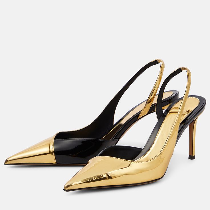 Elevate your style with these glamorous Gold Black Metallic Stiletto Heels. Featuring a pointed toe and slingback design, they are perfect for adding a touch of sophistication to any outfit. Color: Gold and black Material: Metallic finish Heel Type: Stiletto heel Heel height: 3.54" / 90 mm approx Product measurements were taken using size 8. Please note that measurements may vary by size. Toe: Pointed toe Stylish two-tone splicing design. Handcrafted US sizing. Fits true to size. Party Slingback Pumps With Branded Heel Counter, Party Slingback Pumps With Branded Open Heel, Party Patent Leather Slingback Pumps With Heel Strap, Patent Leather Slingback Pumps With Heel Strap For Party, Patent Leather Slingback Kitten Heels For Party, Elegant Pointed Kitten Heels For Party, Chic Patent Leather Kitten Heels For Party, Party Slingback Pumps With Sculpted Open Heel, Glamorous Pointed Toe Slingback Pumps For Night Out