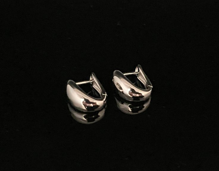 Small Dome Shape Huggie Earrings - 925 Sterling Silver - High polished non tarnishing finish Weight: 2.5 grams Drop Length: 15mm Width: 4mm Hallmark 925 Free Domestic Shipping Classic Silver Hallmarked Huggie Earrings, Silver Huggie Earrings With Shiny Finish, Silver Huggie Earrings For Gift With Shiny Finish, Silver Huggie Earrings With Shiny Finish For Formal Events, Silver Huggie Earrings With Shiny Finish For Formal Occasions, Formal Silver Huggie Earrings With Shiny Finish, Silver Huggie Earrings For Formal Occasions, Huggie Earrings, Jewelry Earrings Hoops