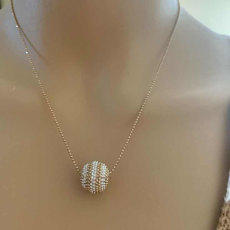 Beautiful Two Toned Ball Feeding Through A Gold Ball Chain. Heart Stone Necklace, Gold Ball Chain, Gold Lariat Necklace, Heart Choker Necklace, Pearl Strands Necklace, Crystal Choker Necklace, Silver Necklace Statement, Moon Pendant Necklace, Filigree Pendant