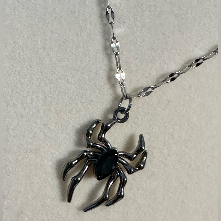 Black And Silver Tone Spider Charm On A Silver Tone Stainless Steel Chain. *Brand New. *Silver And Black Tone. *Stainless Steel Chain. *Aluminum Zinc Alloy Charm. *Unisex, Women, Men, Boys, Girls. Gothic Stainless Steel Silver Chain Jewelry, Halloween Stainless Steel Chain Necklace, Gothic Sterling Silver Jewelry With Lobster Clasp, Black Halloween Jewelry With Adjustable Chain, Gothic Silver Stainless Steel Necklace, Punk Style Black Necklace For Gift, Halloween Black Metal Necklace, Edgy Black Necklaces For Gift, Edgy Black Necklaces For Gifts