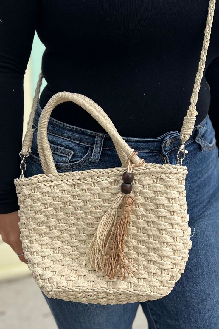 Cute small straw boho beach bag with shoulder strap. Dimensions: 7.5” x 11” Braided Jute Bags, Beach Season Straw Crossbody Bag With Braided Handles, Summer Straw Crossbody Bag, Vacation Straw Crossbody Bag With Braided Handles, Vacation Braided Handles Crossbody Straw Bag, Vacation Crossbody Straw Bag With Braided Handles, Trendy Crochet Crossbody Bag For Beach Season, Chic Braided Straw Bag For Day Out, Beige Straw Shoulder Bag With Adjustable Strap