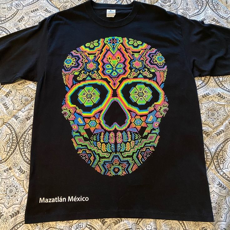 Never Worn Large Black T-Shirt With Very Bright Puffy-Painted Skull. Purchased In Mazatln Mexico. Very Striking. Chest 21” & Length 29” Casual Neon T-shirt With Screen Print, Neon Cotton Crew Neck T-shirt, Black Cotton Rave T-shirt, Black Rave T-shirt With Screen Print, Casual Black Glow In The Dark Top, Neon Graphic Print T-shirt With Crew Neck, Black Graphic Tee For Festivals, Black Graphic Tee For Festival, Black Crew Neck Rave T-shirt