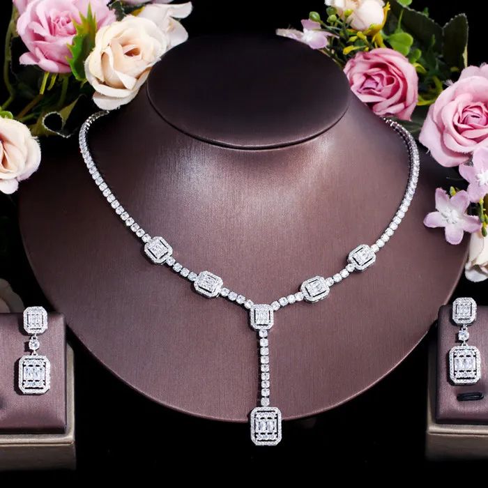 Complete your wedding look with this elegant Bridal Necklace and Earring Jewelry Set. The set is designed to add a touch of sophistication and style to your bridal ensemble, making you shine on your special day.
– This bridal a plus cubic zirconia gemstone necklace set is perfect for adding elegance to any bridal ensemble.– Made with high-quality materials, this set includes a stunning necklace and matching earrings for a complete look.– Perfect for pageant, bridal, bridesmaid, prom, quinceañera Unique Wedding Necklaces, Crystal Bridal Jewelry Sets, Real Diamond Necklace, Wedding Party Accessories, Wedding Look, Prom Jewelry, Fashion Jewelry Sets, Fancy Jewellery, Women Necklace