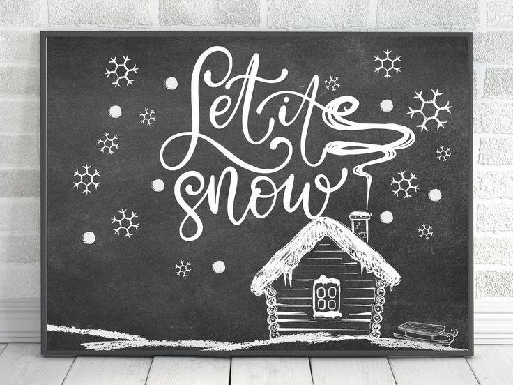 a chalkboard with the words let it snow written on it