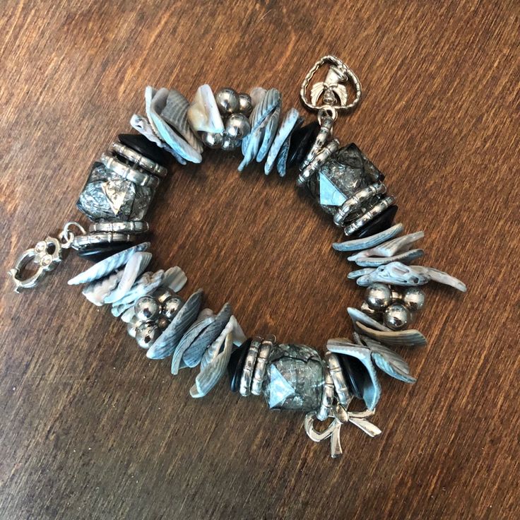 One Of A Kind Edgy Charm Bracelet That Incorporates Shells And Beads. Great Unique Appearance And Never Worn Before. One Size Fits All Womens Jewelry Bracelets, One Size Fits All, Black Silver, Beading, Shells, Charm Bracelet, Women Jewelry, Turquoise, Bracelet