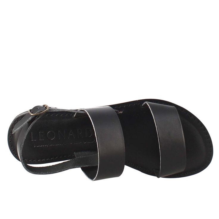 Roman style women's sandal with double band



 Smooth vegetable tanned black leather

 
Leather sole



 Handmade



 Made in Italy




 Composition:
 Upper: 100% Leather
 Lining: 100% Leather
 Bottom: 100% Leather
 Insole: 100% Leather

 Narrow fit, it is recommended to take one size larger than usual. Black Leather Slingback Sandals With Round Toe, Leather Ankle Strap Sandals, Black Sandals With Leather Sole, Black Sandals With Leather Footbed, Black Open Toe Slingback Sandals With Leather Footbed, Black Slingback Sandals With Leather Footbed, Double Strap Leather Footbed Sandals, Black Leather Slingback Sandals With Leather Footbed, Black Leather Slingback Sandals