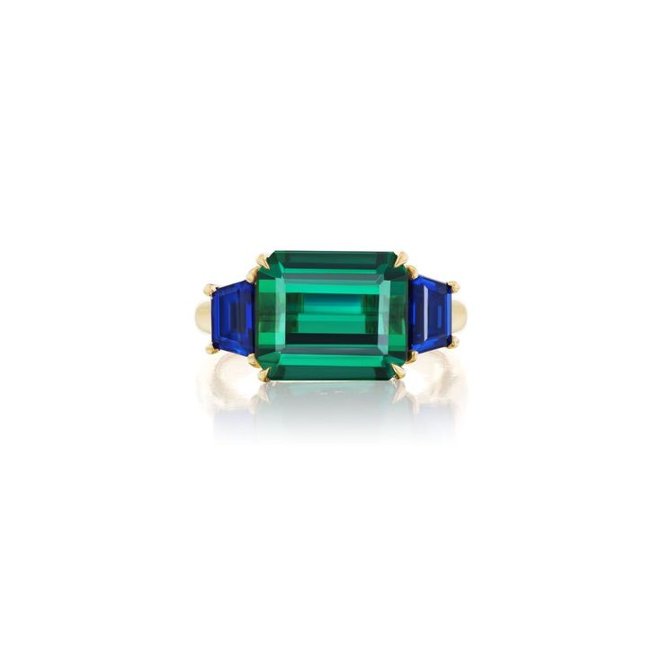 The Caroline RingAnne Baker Luxury Green Sapphire Ring Gia Certified, Green Gia Certified Luxury Sapphire Ring, Green Gia Certified Sapphire Ring, Luxury Green Sapphire Ring With Accent Stones, Luxury Green Multi-stone Emerald Ring, Formal Green Multi-stone Sapphire Ring, Luxury Green Tsavorite Gemstones, Classic Green Multi-stone Sapphire Ring, Luxury Green Sapphire Ring With Gemstone Accents