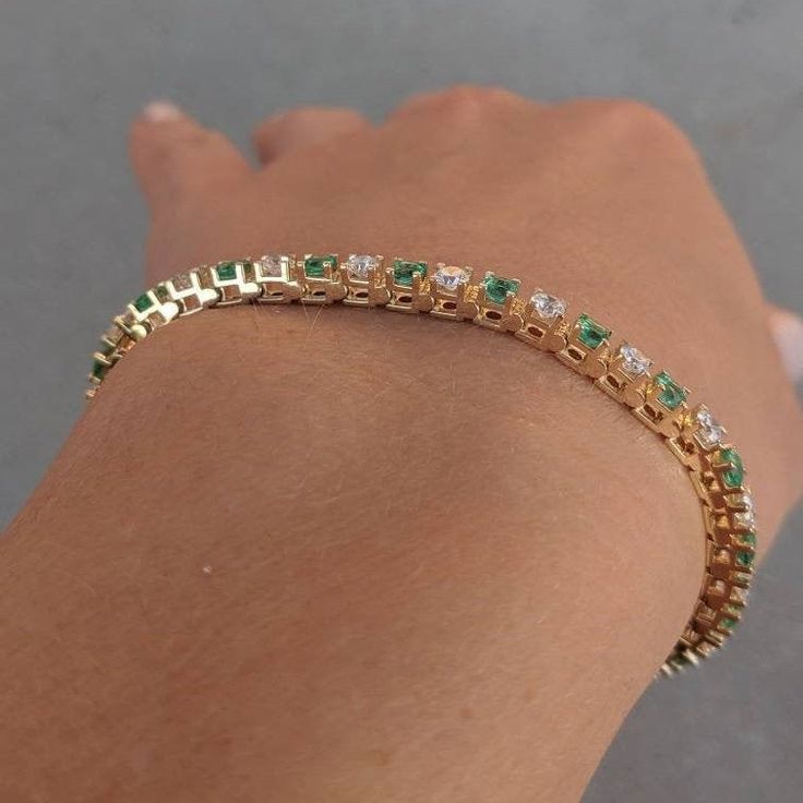 This stunning tennis bracelet features alternating sparkling prong-set diamonds and emeralds, with a box clasp with a figure 8 locking hinge for added security. Available in 14k and 18k yellow, white gold or platinum, just choose desired material from the drop-down menu before checkout. This bracelet is fully customizable. If you prefer different size dimensions, different quality diamonds or moissanites or other colored gemstones, please contact us today to get started on a custom order: http:/ Fine Emerald Tennis Bracelet For Formal Occasions, Fine Emerald Tennis Bracelet For Formal Events, Green Diamond Tennis Bracelet For Formal Occasions, Formal Emerald Diamond Bracelet With Brilliant Cut, Emerald Tennis Bracelet With 17 Jewels For Wedding, Emerald Cut Tennis Bracelet With Prong Setting For Anniversary, Green Brilliant Cut Diamond Bracelet For Anniversary, Formal Green Diamond Tennis Bracelet, Classic Emerald Tennis Bracelet With Jubilee Style