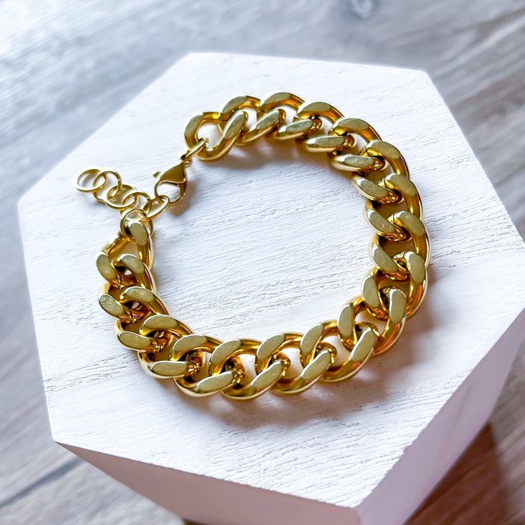 This Bracelet Is Gorgeous In Its Own Element. Just Made To Stand Out. Material: 18k Gold On Stainless Steel Length: 16cm+3cm | 6"+ 1" Extender Width: 10mm Tarnish Resistant Gold Cuban Link Bracelet As Gift, Gold Plated Curb Chain Bracelets As Gift, Gold Chain Bracelet With Curb Chain For Gift, Gold Plated Chain Link Bracelet As Gift, Trendy Gold Bracelet With Solid Link Construction For Gift, Gold Jubilee Bracelet Chain Link As Gift, Gold Cuban Link Chain Bracelet For Gift, Gold Plated Curb Chain Bracelet For Gift, Gold Curb Chain Bracelet For Gift