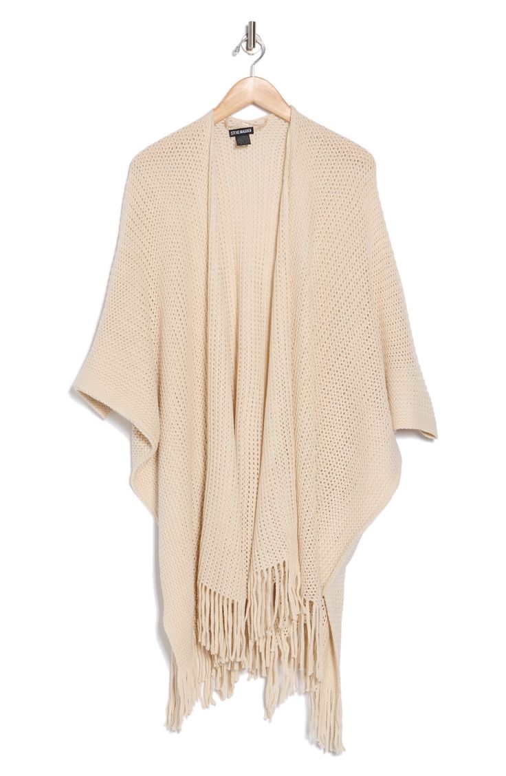 Love to layer this throw-on-and-go ruana that features an open knit design. 42" x 30" Open front Three-quarter sleeves Hand wash, dry flat Imported Model stats: 5'10", 32" bust, 25" waist, 36" hip. Model is wearing size OS. Spring Beige Knit Poncho, Beige Poncho For Spring Layering, Beige Knit Poncho For Spring, Pink Leather Jacket Outfit, Pink Leather Jacket, Leather Jacket Outfits, Kimono Sleeves, Jacket Outfit, Kimono Sleeve