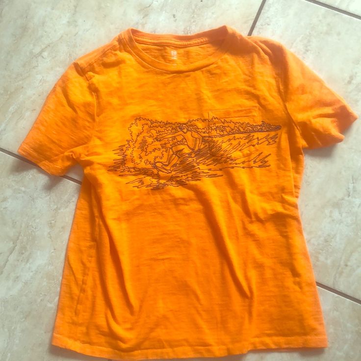 Nwot Sie 10 Orange Surfer T-Shirt Gap Short Sleeve Graphic Print T-shirt, Gap Short Sleeve Graphic T-shirt, Gap Graphic Print T-shirt, Casual Screen Print Tops By Gap, Gap Graphic Tee With Screen Print, Gap Graphic Tee With Graphic Print, Gap Cotton T-shirt With Letter Print, Gap Crew Neck Screen Print T-shirt, Gap Graphic Print Crew Neck T-shirt