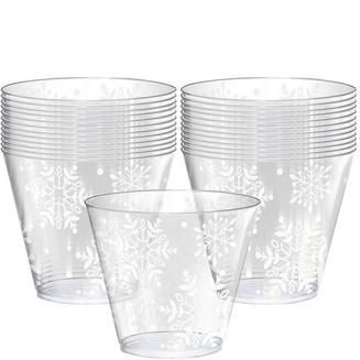 frosted glass cups with white snowflakes on the rims are lined up