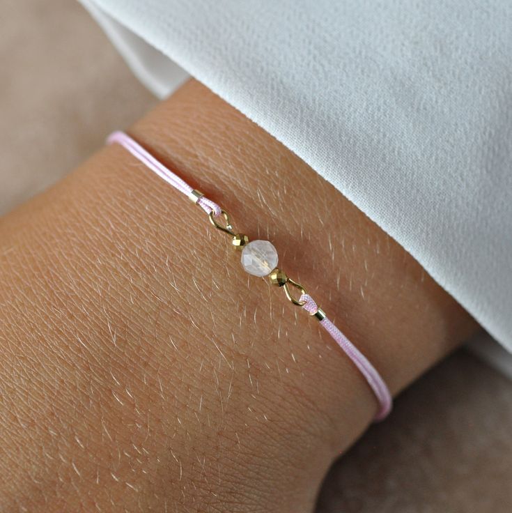 This 4mm faceted rose quartz bracelet is simple, elegant, and is totally adjustable. It can be worn daily with casual or more fancy outfits and is great for layering. It is also easy and comfortable to wear. Made with natural crystals and high-quality soft nylon cord which makes it a long-lasting piece of jewelry. Bracelet is abrasion-resistant and water. ✦ Your bracelet will be packed in a hand made envelope with a brand logo, making it perfect for gifting  ✦ If you want to give jewelry to a loved one and leave a message for them, give me its content in the message when buying  ✦ Perfect bracelet: ✦ * for myself :) * as a gift for mom/sister/friend * as a thank you to the bridesmaid * as a gift for girlfriend/fiancée/wife ✦ More Bracelets - www.etsy.com/shop/LaCannet?section_id=30596478 ✦ Adjustable Dainty Crystal Bracelet For Friendship, Dainty Adjustable Crystal Bracelet For Friendship, Minimalist Pink Hypoallergenic Bracelets, Adjustable Faceted Crystal Bracelet In Minimalist Style, Adjustable Faceted Beaded Bracelets Minimalist Style, Minimalist Adjustable Faceted Beaded Bracelets, Elegant Adjustable Crystal Friendship Bracelet, Minimalist Adjustable Faceted Crystal Bracelet, Elegant Adjustable Crystal Bracelet For Friendship