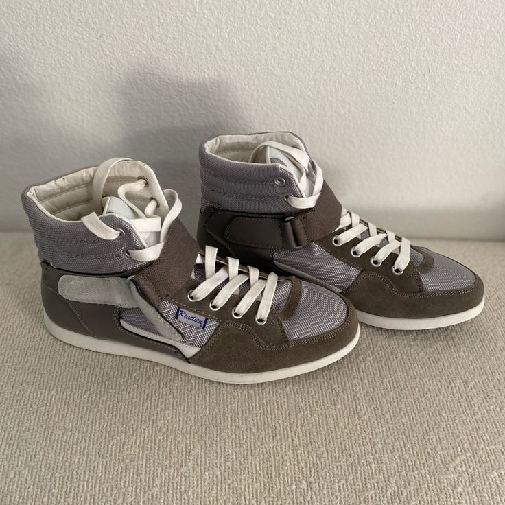 New Ship Next Business Day Silver Leather High-top Sneakers For Streetwear, Modern Gray Sneakers With Reflective Details, High-top Leather Sneakers With Reflective Details, Sporty Silver High-top Sneakers, Sporty Silver High-top Sneakers For Sports, Silver Lace-up High-top Sneakers, Modern Gray High-top Sneakers, Leather Sneakers With Reflective Details And Round Toe, Modern Sneakers With Reflective Details And Round Toe