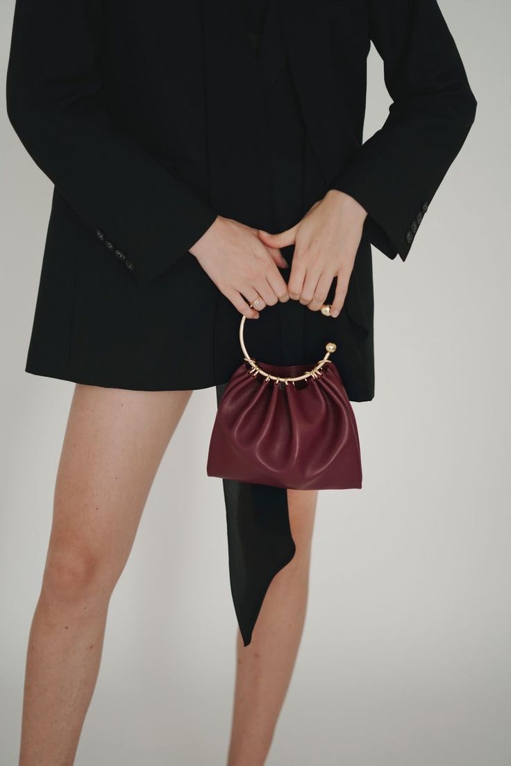 Details Charming and versatile, this Gold-Plated Ring Handle Bag can be styled for your perfect evening dinner outfit! No matter the style of wear, the soft leather is a bronze example of quality. 100% Cow Leather. Size Length: 21cm Height: 17cm Handle Diameter: 11.5cm Weight: 200g Shipping & Return Free US shipping on orders over $100.Free International shipping on orders over $300. For more details click HERE. Chic Evening Clutch With Gold-tone Hardware, Leather Clutch With Detachable Handle For Party, Evening Leather Clutch With Detachable Handle, Leather Clutch With Detachable Handle For Evening, Leather Top Handle Clutch For Party, Leather Clutch With Detachable Strap For Night Out, Leather Clutch Evening Bag For Night Out, Elegant Evening Bag With Round Handle, Elegant Shoulder Bag With Dust Bag And Round Handle