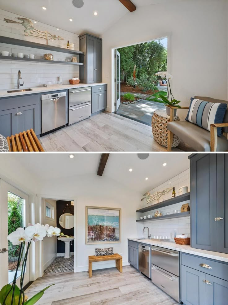 this kitchen has gray cabinets and stainless steel appliances, along with an open floor plan