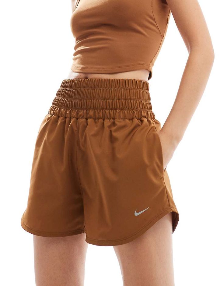 Shorts by Nike Training A gym-bag essential High rise Elasticized waistband Pocket details Nike branding Regular fit Brown Gym Bottoms With Built-in Shorts, Gym Bottoms With Built-in Shorts In Brown, Brown Athleisure Activewear With Built-in Shorts, Brown Athleisure Workout Shorts, Brown Athleisure Shorts For Workout, Brown Athleisure Bottoms For Workout, Brown Sporty Activewear With Elastic Waistband, Brown High Waist Activewear For Workout, Sporty Brown Activewear Shorts