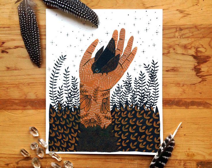 a card with an image of a hand holding a bird in the middle of it