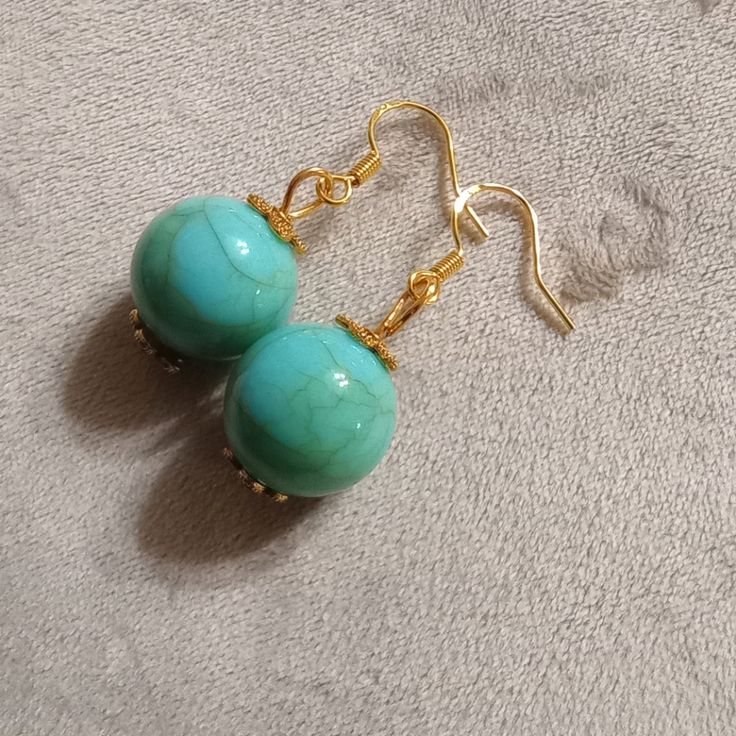 Turquoise Beads Gold Tone Setting Gold Tone Hooks Hooks Are Silver Marked (925) Come W/ Earring Backs New With Tag Elegant Turquoise Jade Jewelry, Turquoise Beaded Round Earrings, Turquoise Jade Earrings With Natural Stones, Hypoallergenic Turquoise Beaded Earrings, Turquoise Beaded Earrings With Natural Stones, Turquoise Jewelry With Dangling Round Beads, Turquoise Jade Earrings For Gift, Elegant Turquoise Earrings With Dangling Beads, Elegant Turquoise Beaded Dangling Earrings