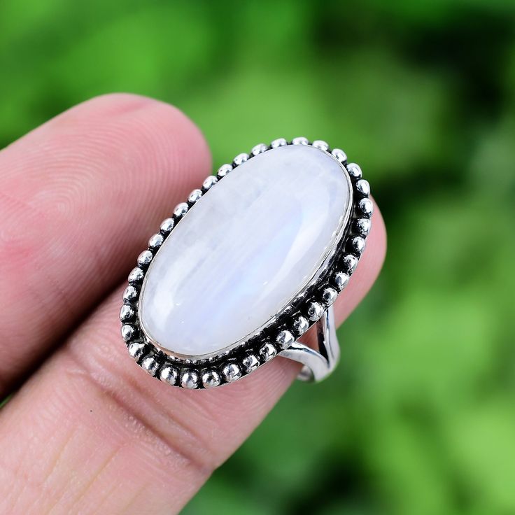 Welcome to 925SilverArtz Rainbow Moonstone Ring 925 Sterling Silver Ring Genuine Gemstone Bohemian Ring Handmade Silver Jewelry Ring Gift For Her RJS136 Gemstone: Rainbow Moonstone (Genuine) Ring Size: As Available (US) Why to wear Silver Jewelry: Since ancient times, silver has been prized for its aesthetic appeal, toughness, and purported therapeutic benefits. The mind and emotions are also believed to be calmed by it. When silver is paired with gemstones, the two can enhance one another's advantages. By acting as an energy conductor, the silver aids in removing harmful energy from the body and replacing it with the gemstone's beneficial energy. This can enhance general wellbeing, lessen tension and anxiety, and speed up the healing process. On the other hand, the gemstone can give the s Silver Bohemian Moonstone Ring, Spiritual Moonstone Crystal Ring, Bohemian Sterling Silver Moonstone Open Ring, Bohemian Moonstone Crystal Ring With Gemstone, Bohemian Silver Opal Open Ring, Bohemian Silver Open Opal Ring, Bohemian Sterling Silver Moonstone Ring, Bohemian Round Cabochon Moonstone Ring, Bohemian Cabochon Moonstone Ring