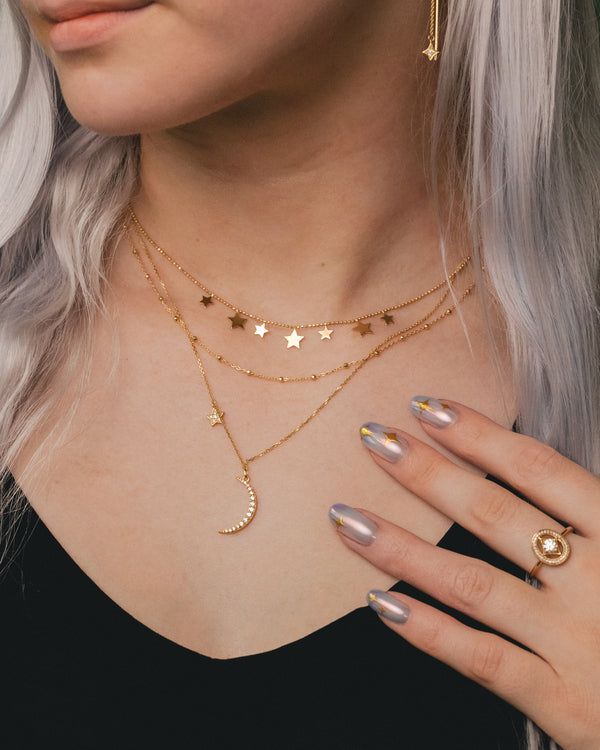 This 14K gold Saturn Chain features 1.7mm faceted bead elements. A unique, modern chain that will become a staple in your wardrobe. NECKLACE DETAILS: Length: 16 Inches & 18 Inches Millimeter: 0.90 Closure: Lobster Average Weight (g): 16" is 1.67 grams; 18" is 1.84 grams Available in 14K Yellow Gold ***These necklaces have a 4 week lead time. If you need your necklace sooner than that, please contact us prior to ordering to verify if that's possible.*** | Faceted Bead Saturn Chain Necklace In 14K Yellow Gold Ring - by Staghead Designs - Unisex Adjustable Chain Necklace For Layering, Fine Jewelry Layering Pieces With Adjustable Chain, Fine Jewelry With Adjustable Chain, Fine Jewelry With Adjustable Chain For Layering, Dainty 14k Gold Chain Charm Necklace, Silver 14k Gold-filled Pendant Jewelry, Yellow Gold Celestial Jewelry In 14k Gold Filled, Celestial Style Gold-plated Yellow Gold Jewelry, Celestial Jewelry For Everyday