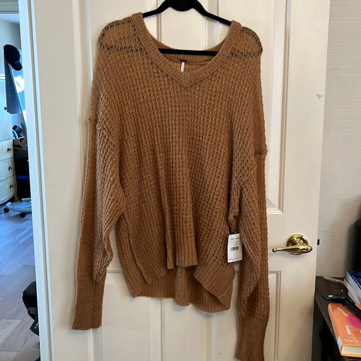 Free People Oversized Knit Sweater In A Beautiful Caramel Color Size Small New With Tags!! I Received It As A Gift And It’s Just Not My Style :) Oversized Knit Sweater, Oversized Knitted Sweaters, Caramel Color, Free People Sweaters, Free People Sweater, Sweaters Oversized, V Neck Sweater, Colorful Sweaters, Vneck Sweater