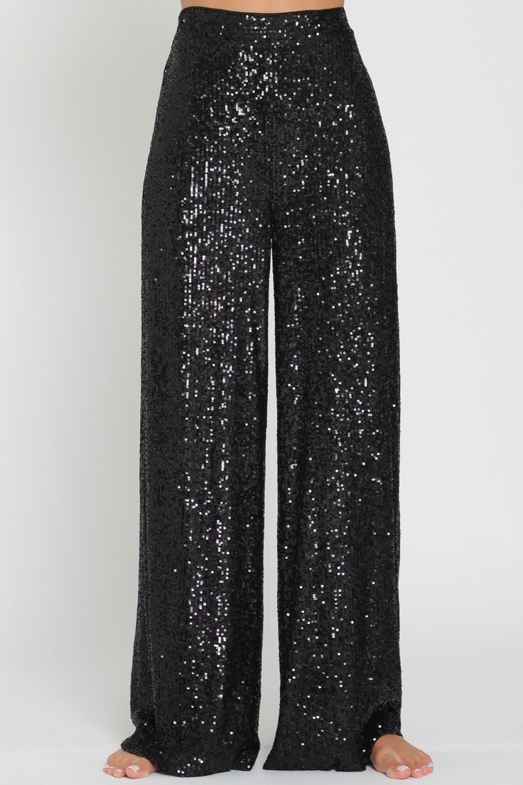 Slip into something sparkly! Our high waisted sequin pants are the perfect party pieces for those looking to glam up their night out - they'll hug your curves and show off your booty! With an elastic back waist, polyester lining, and shimmering sequins, these sleek pants are sure to turn heads. Shine on! Black Sparkly Pants, Black Pants Outfit Dressy Party, Elegant Sequinned Bottoms For Night Out, Elegant Sequined Bottoms For Holiday Party, Shimmer Bottoms For Party And Holiday Season, Elegant Glitter Bottoms For Evening, Holiday Party Shimmer Bottoms, Stretch Embellished Bottoms For Evening, Embellished Stretch Bottoms For Evening