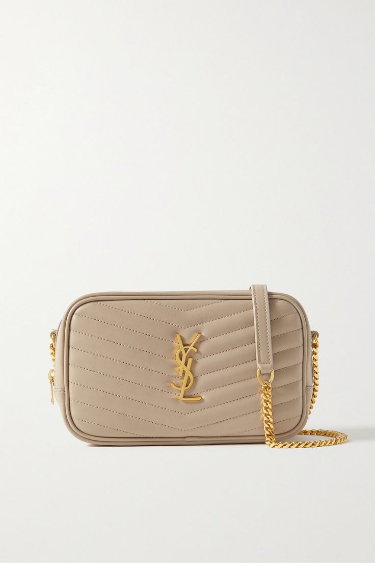 Find SAINT LAURENT Lou Mini Matelassé Leather Shoulder Bag on Editorialist. The SAINT LAURENT Lou shoulder bag is crafted from matelassé leather and features a gold-tone 'YSL' logo plaque. The bag has a chain strap and is perfect for carrying the essentials. The bag is made in Italy. Ysl Mini Lou, Cream Bags, Saint Laurent Bag, Mini Shoulder Bag, Quilted Leather, Chain Strap, Ysl Bag, Mini Bag, Accessories Design