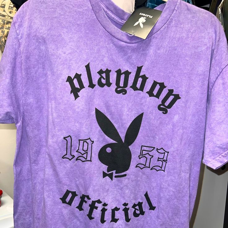 Playboy Nwt Purple T-Shirt Size L In Women! Cute For A Gift Urban Purple Cotton T-shirt, Urban Style Purple Cotton T-shirt, Trendy Purple T-shirt With Logo Print, Purple Crew Neck Top With Letter Print, Purple Letter Print Tops For Streetwear, Purple Letter Print Crew Neck Top, Trendy Purple Tops With Letter Print, Urban Purple Short Sleeve T-shirt, Trendy Purple Tops With Logo Print