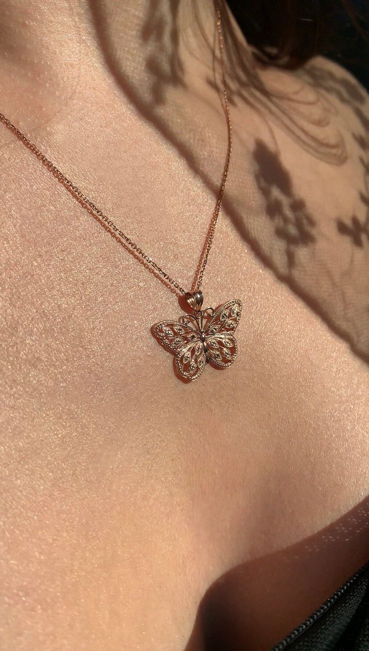 Give her the gift of wings with this beautiful butterfly necklace. DETAILS - 14k rose gold butterfly - Both pendant and chain are 14k rose gold - Chain style may vary slightly - Approximately 1 inch wide x 3/4 inch tall (including bail) VARIATIONS If you require any variation of this style (a different style chain, longer chain, etc.) feel free to message us. We will do our best to accommodate you. Additional costs may apply depending on the variation. POLICY We do accept returns on this item minus a $25 restocking fee. Return shipping is the responsibility of the buyer. Any expedited shipping will not be refunded. If you have any questions, concerns, or are unsatisfied in any way with your order, feel free to message us and we will do our best to work with you. Chase Collins, Gold Butterfly Necklace, Rose Gold Butterfly, Girls Things, Butterfly Necklace Gold, Necklace Butterfly, Rose Gold Chain, Gold Box, Gold Butterfly