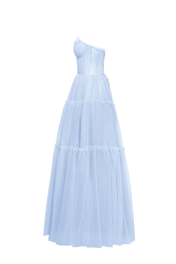 Dreamy tulle dress in light blue color with a light ruffled tulle maxi skirt. This dress has a heart-shaped boned semi-transparent bodice with built-in cups and a corset back, which makes the silhouette fitted and elegant. The A-line maxi skirt is made from multiple layers of delicate tulle that emphasize the hourglass silhouette. The waistline is adorned with a silver belt with Milla’s signature. Details: Material: Tulle Fabric composition: 100% Polyester, 100% Nylon Sleeve style: Sleeveless Silhouette: A-line Skirt length from waist: 116 cm / 45.6 inches Dress weight: 1.14 kg / 2.5 lbs Neckline: Heart-shaped neckline Back: Lacing closure Lining: Light blue full-length flared underskirt Model is: 180 cm / 83-60-95, wearing size S Art.N.: 9000-10 Light Blue Floor-length Dress With Voluminous Skirt For Spring, Sheer Tulle Maxi Dress For Prom Season, Summer Organza Gown With Sheer Bodice, Summer Gown With Sheer Bodice In Organza, Spring Floor-length Ball Gown, Spring Tulle Gown With Sheer Bodice, Summer Tulle Dress With Pleated Bodice, Summer Dresses With Pleated Bodice And Tulle Material, Summer Ball Gown Maxi Dress For Gala