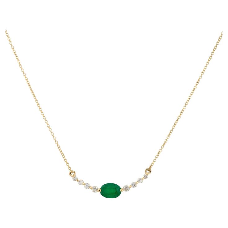 14k Yellow Gold 0.85ctw Oval Emerald and Diamond Curved Bar Necklace Material: 14k Yellow Gold Gemstone/Diamond Details: Approximately 0.85ctw of Oval shaped Emerald. Approximately 0.21ctw of Round Diamonds Measurements: Necklace Measures 18.5″ in Length, Diamond bar measures approximately 1" in Length Fastening: Spring Ring Clasp Item Weight: 2.33g (1.5dwt) Additional Details: This item comes with a presentation box! SKU: G12943 American Art Deco, Art Deco Emerald, Curved Bar Necklace, Anniversary Necklace, Curved Bar, Oval Necklace, Diamond Bar, Emerald Diamond, Bar Necklace